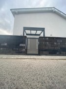 Zadaszenie nad drzwi POLLUX ze szkłem model 2022